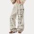 Graffiti Apricot Wide Leg High Waisted Denim Jeans in streetwear style.